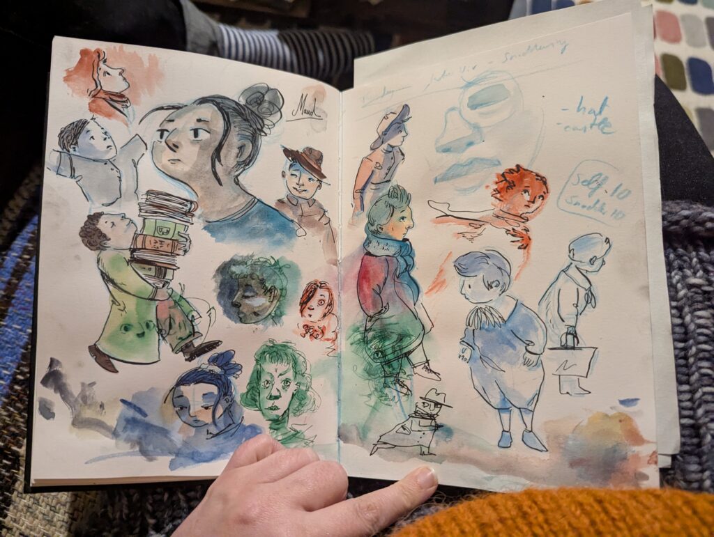 A page of ink and wash drawings of people.